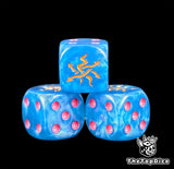Three blue Tzeentch dice with magenta pips and a gold Chaos eye