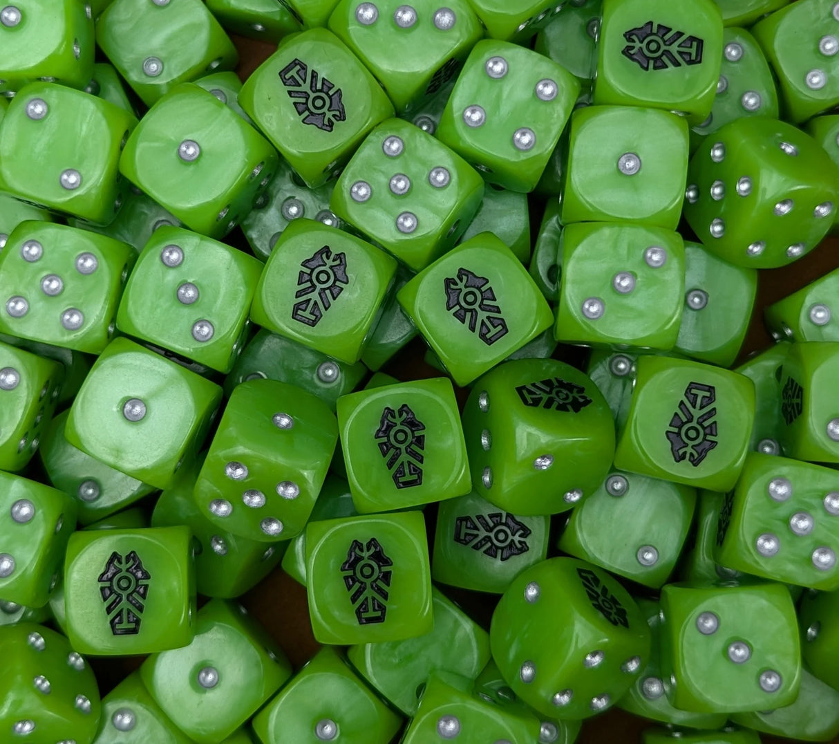 Pile of neon green tomb 16mm D6 dice for a sci-fi undying machine army