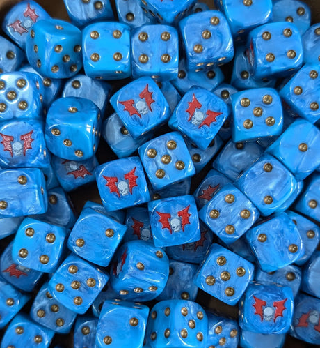 Pile of blue 16mm D6 dice with white winged skulls for a sci-fi terror army