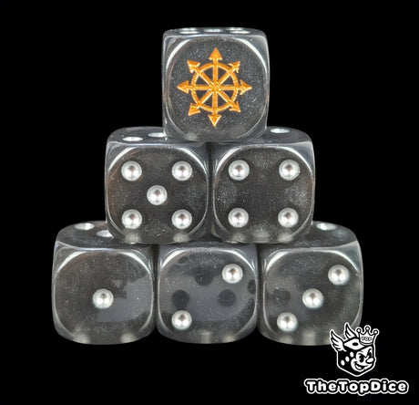 Translucent black resin D6 dice with a gold dark star and silver pips