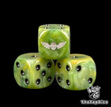 Three olive Imperial Guard dice with black pips and a winged skull