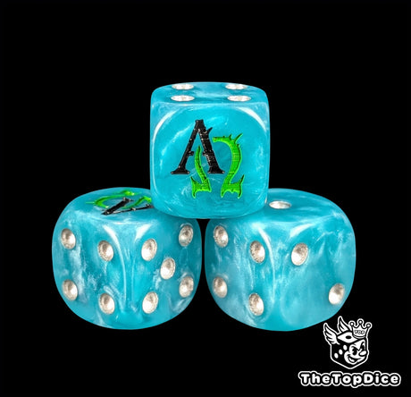 Close up of a turquoise 16mm resin D6 die engraved with a black alpha and a green omega