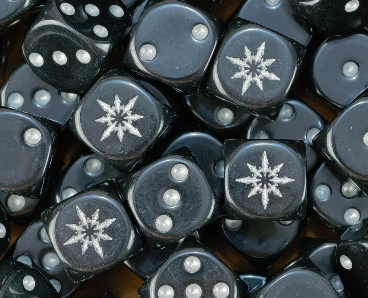 Pile of black chaos star dice with silver stars and silver pips for a Black Legion warband