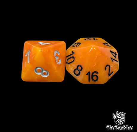 Close up of an orange D8 and D16 with white numbers for scatter and long range rolls