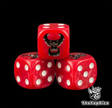 Close up of the black ork skull engraved and hand filled on a red Goff Orks 16mm D6 die