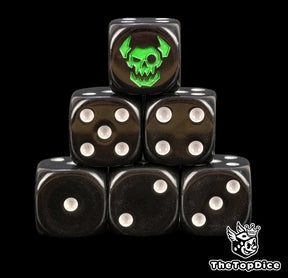 Black Ork D6 dice stacked for a Waaagh, white pips and a green ork skull on the six