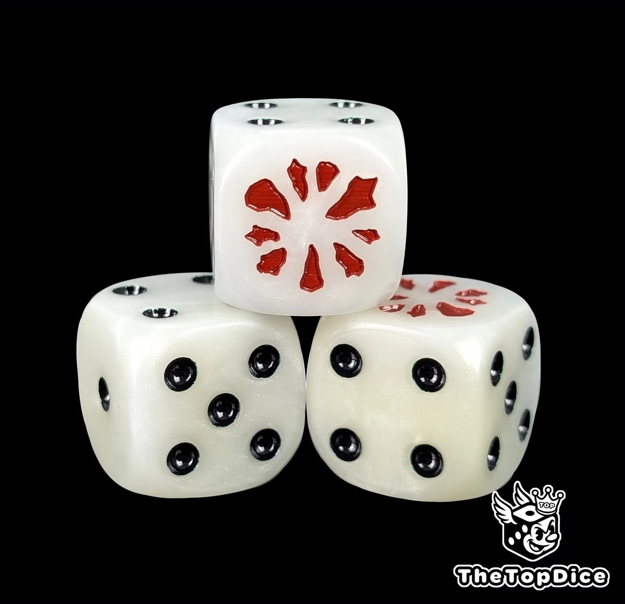 Close-up of a white D6 die with a red open ogre maw