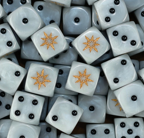 A pile of pearl white chaos D6 with black pips and gold stars