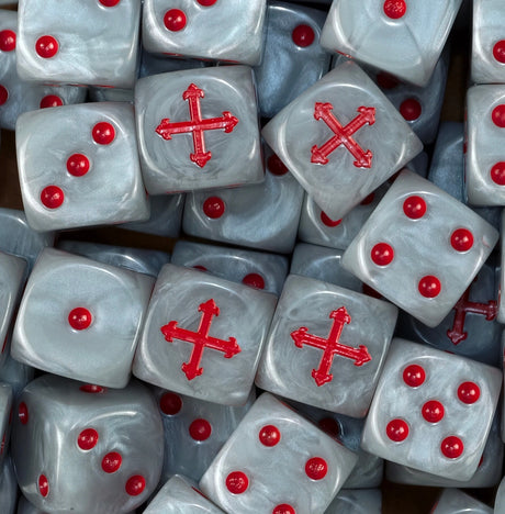 A pile of pearl white Badab War dice, red crosses and red pips repeating
