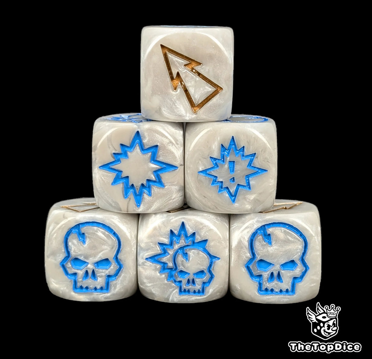 Close up of three bone white 16mm block dice with bronze pips for resolving blocks