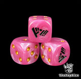Close up of a pink 16mm resin D6 die engraved with gold pips as a TCG power counter