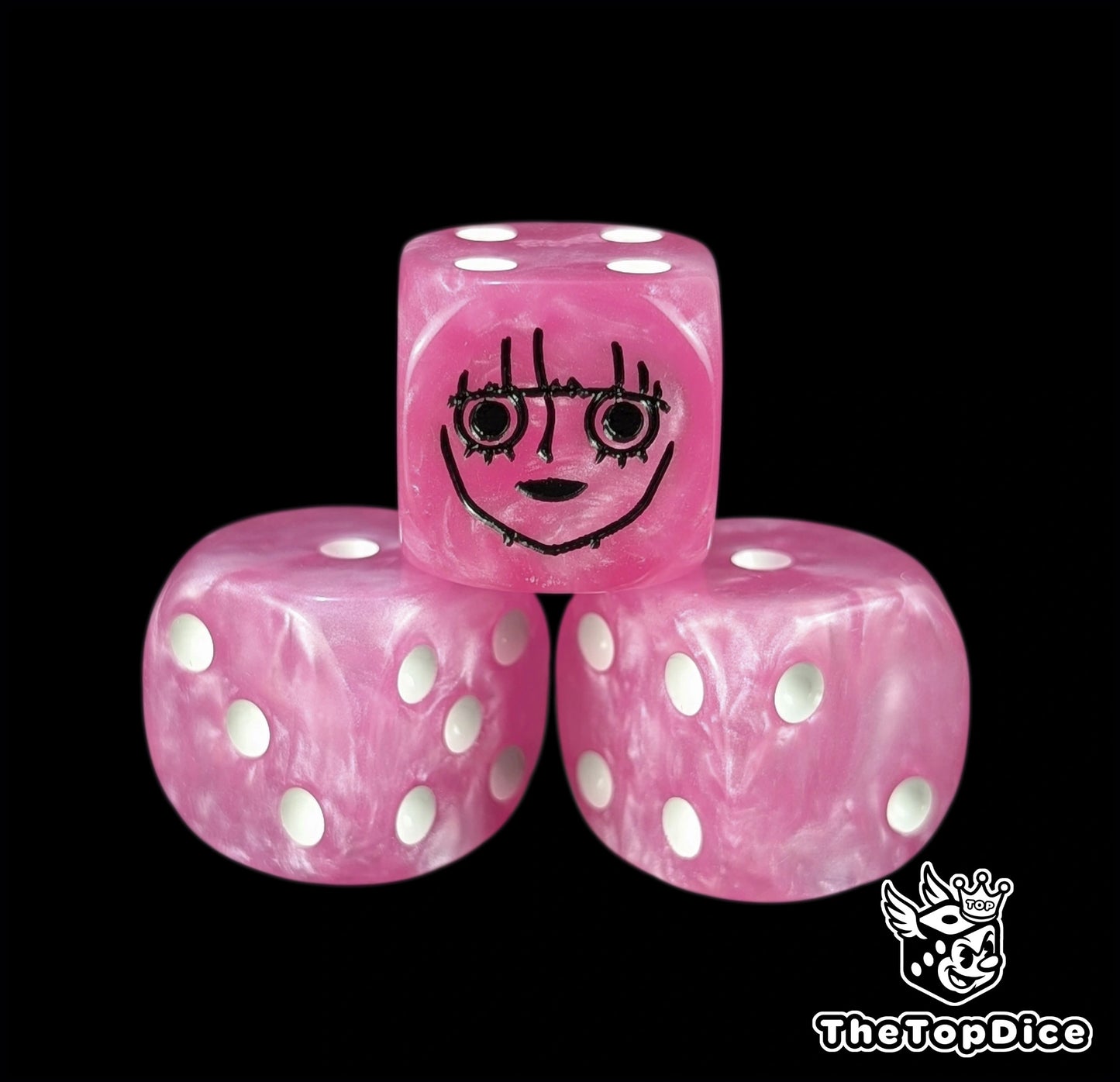 Close up of a pink 16mm resin D6 die engraved with a black ghost princess emblem and white pips