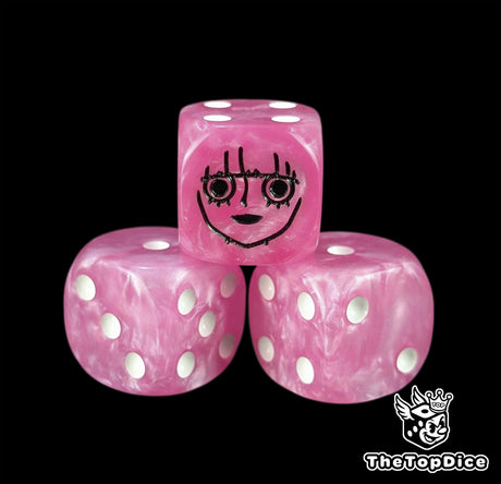 Close up of a pink 16mm resin D6 die engraved with a black ghost princess emblem and white pips