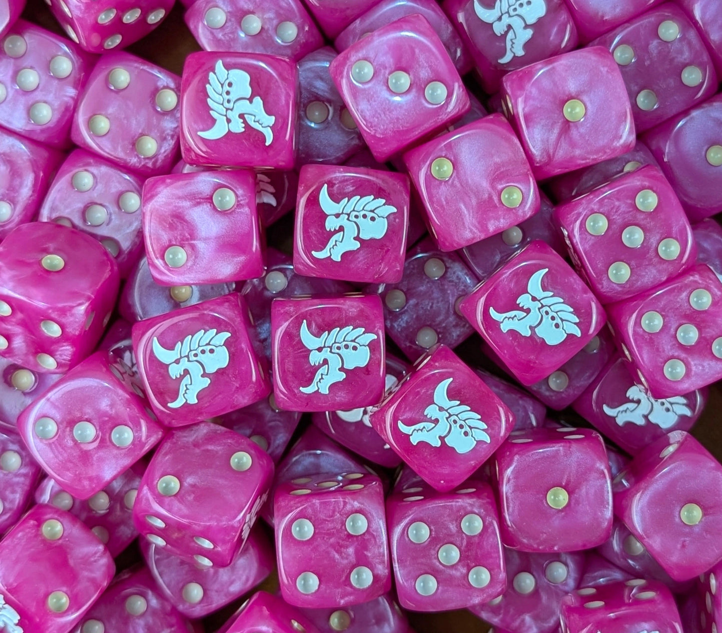 Pile of pink hive alien 16mm D6 dice for a sci-fi xeno swarm