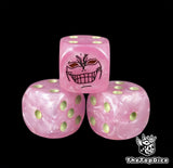 Close up of a pink 16mm resin D6 die engraved with a black villain emblem and yellow pips