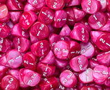 Strawberry D3 dice covering the base of a tray for tabletop play