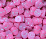 Dozens of fuchsia D3 dice in a tray, one to three, for a roleplaying session