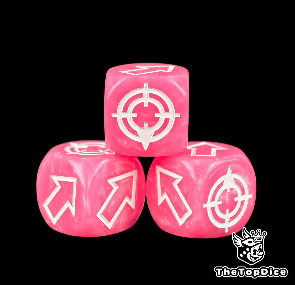 A close pair of arrow faces and one arrowed target on three hot pink resin dice