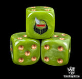 Close up of a rotten green 16mm resin D6 die engraved with a black plague helmet with red eyes and a grey horn