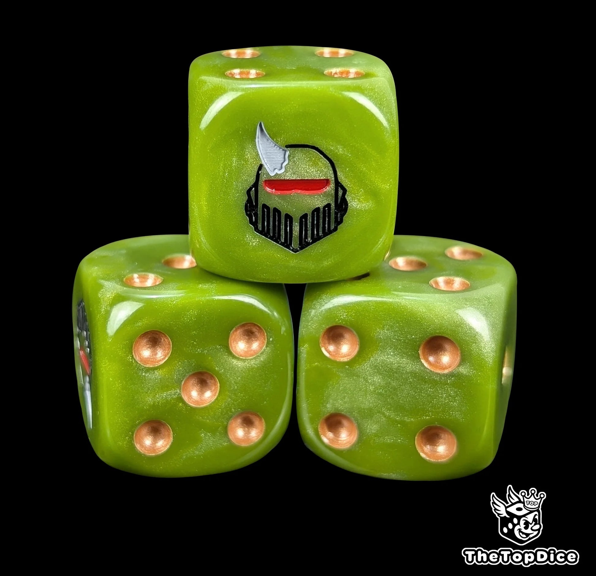 Close up of a rotten green 16mm resin D6 die engraved with a black plague helmet with red eyes and a grey horn