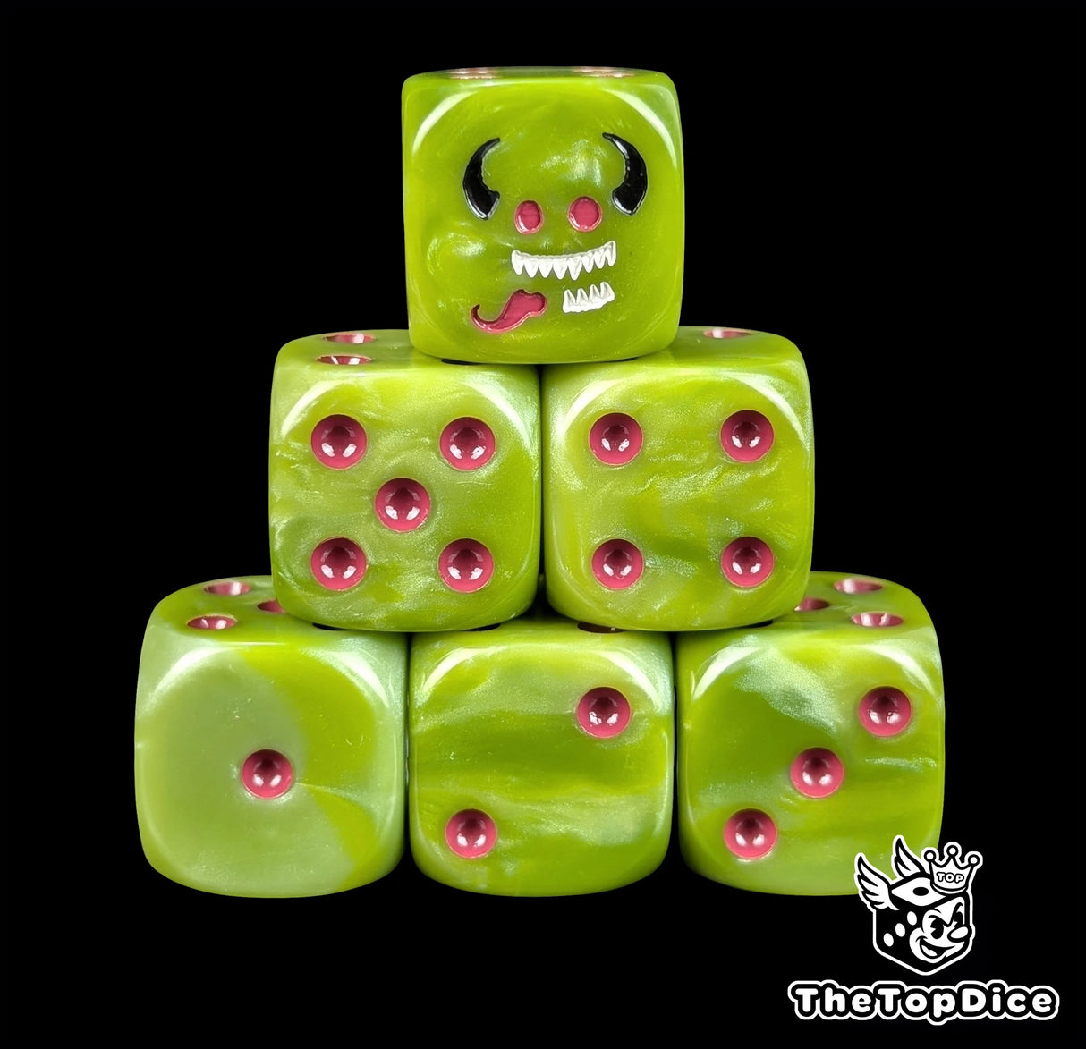 Green 16mm D6 dice with a grinning imp face and purple pips for fantasy wargaming
