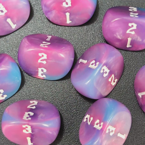 Resin D3 dice in blue, lilac and pink for tabletop battles
