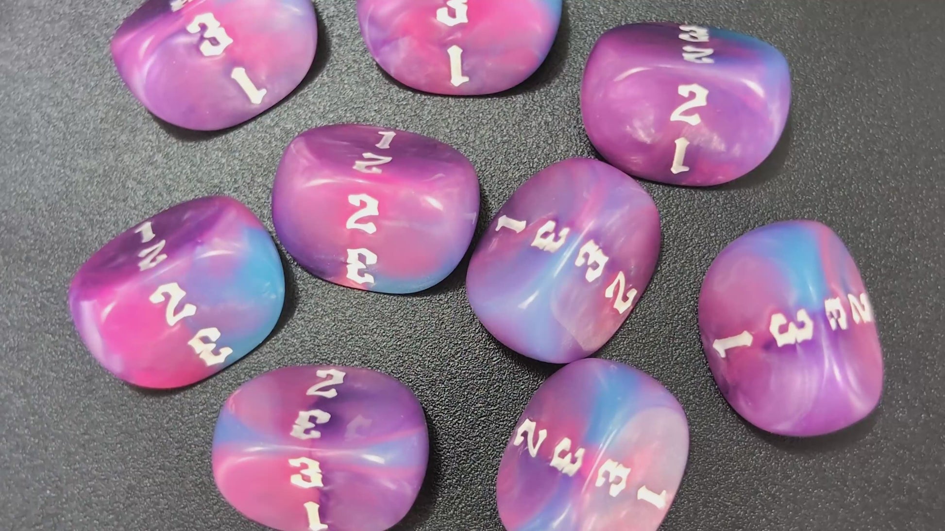 Resin D3 dice in blue, lilac and pink for tabletop battles