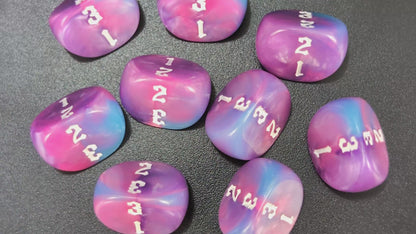 Resin D3 dice in blue, lilac and pink for tabletop battles