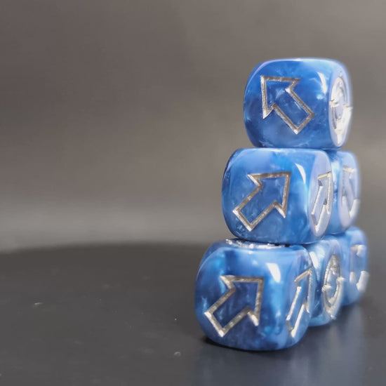 Directional resin dice with engraved arrows