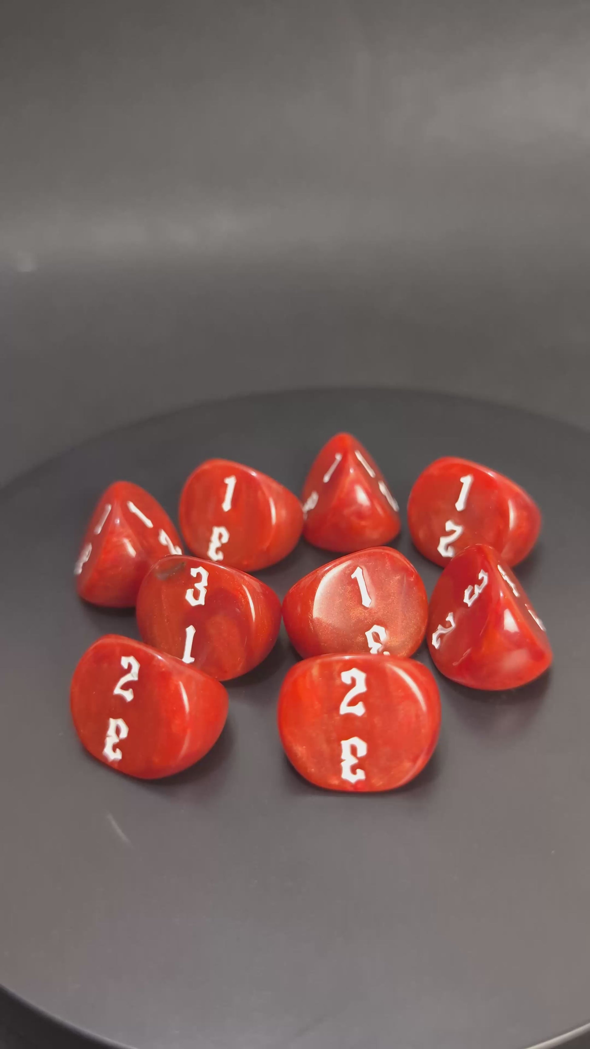 Red and white 3-sided D3 die for wargames and RPG