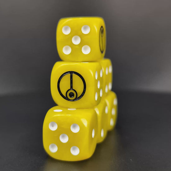 Bright yellow T’au dice set with white markers