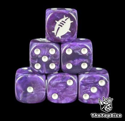 Close up of two purple D6 with a white custom logo on the six face for fantasy football games