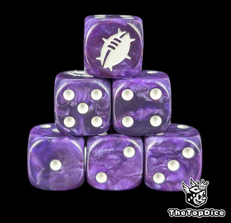 Close up of two purple D6 with a white custom logo on the six face for fantasy football games
