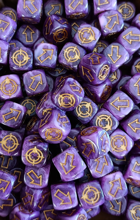 Pile of purple and pink scatter dice for tabletop battles