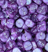 Tray packed edge to edge with violet and white three sided dice