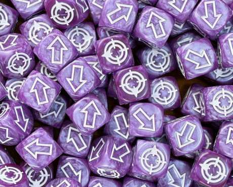 A dice tray loaded with purple and white scatter dice for artillery and random movement