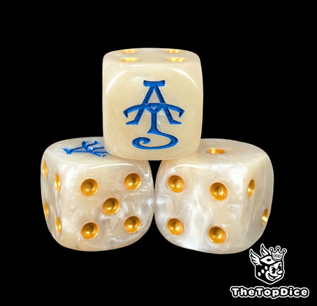 Close-up of a white D6 die with a gold and blue sigil