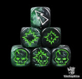 Close up of three black and green 16mm block dice with silver pips for resolving blocks