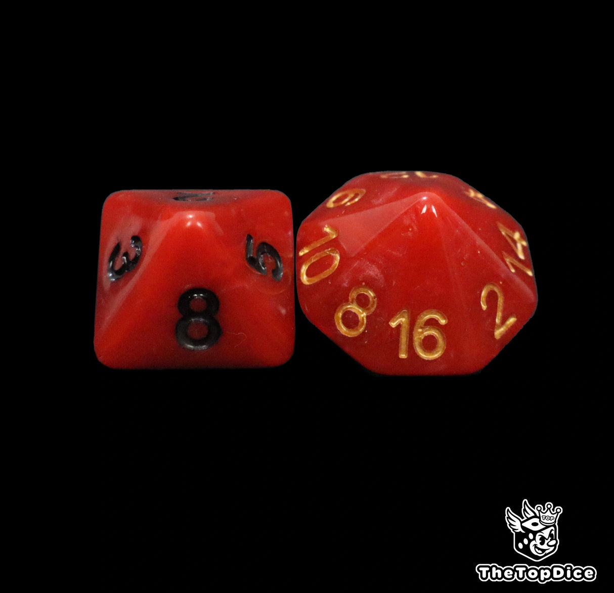 Close up of a red D8 and D16 with black numbers for scatter and long range rolls