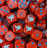 Pile of red 16mm D6 dice with white alien faces for a sci-fi hive army