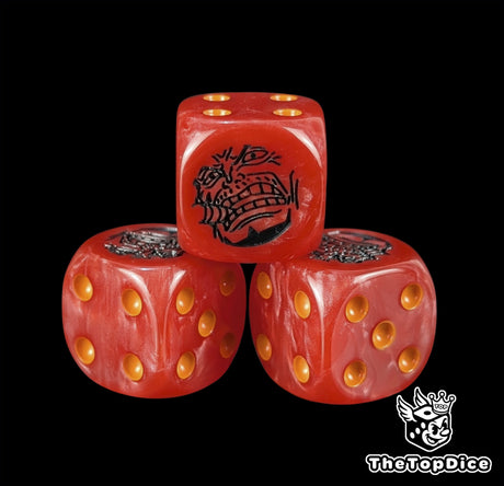 Close up of a red 16mm resin D6 die engraved with a black admiral emblem and orange pips