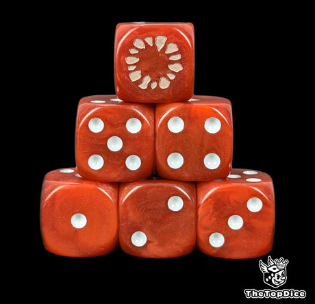 Close up of two red D6 with a brown ogre footprint logo on the six face for fantasy football