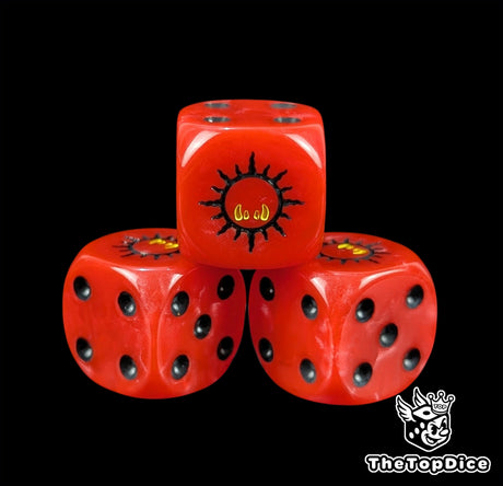 Close up of a red 16mm resin D6 die engraved with a black ork glyph with yellow fangs and black pips