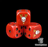 Close up of a red 16mm resin D6 die engraved with a white skull and gold blade and black pips