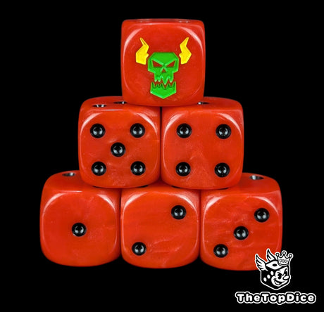 Red 16mm D6 dice with a green ork face and yellow lightning emblem and black pips for sci-fi wargaming