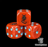 Close up of a red 16mm resin D6 die engraved with a black spirit rune and blue pips