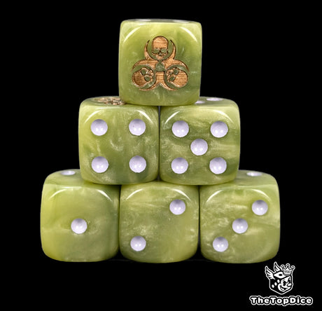 Close up of two green D6 with a gold hazard skull logo on the six face for fantasy football