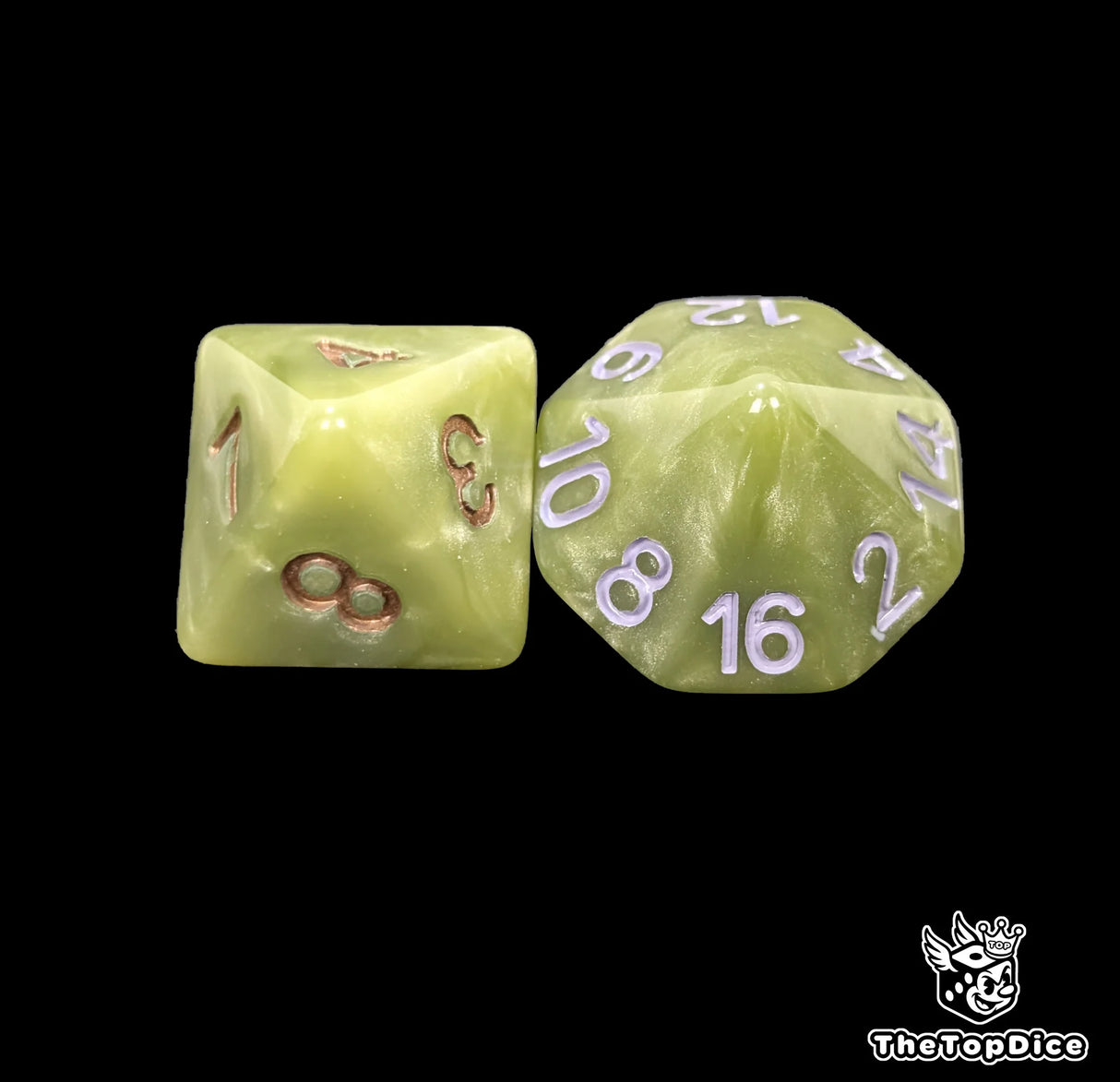 Close up of a green D8 and D16 with white numbers for scatter and long range rolls