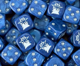 A pile of blue Astral Claws dice, white claws and silver pips repeating