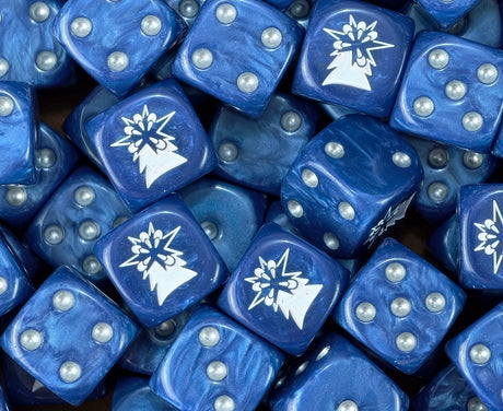 A pile of blue Astral Claws dice, white claws and silver pips repeating